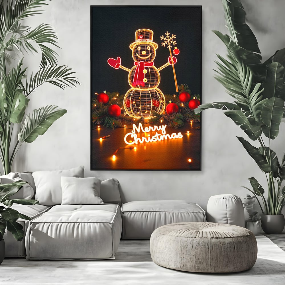 Tablou canvas cu ilustratie cu om de zapada luminos, in rama de aluminiu negru, pe perete intr-un living